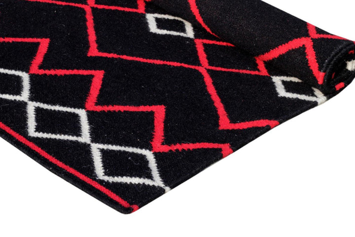 Detailed texture of the Wool Handwoven Rug Vera Red, showcasing a blend of wool and cotton