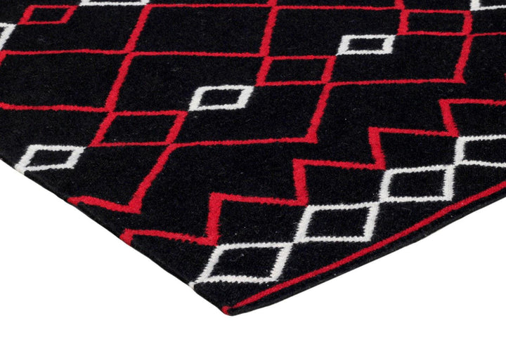 Traditional handmade Wool Handwoven Rug Vera Red from HummingHaus, demonstrating the unique geometric design and color scheme