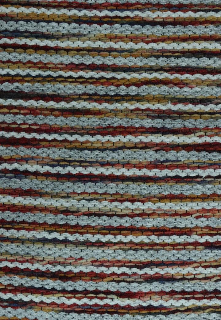 Close-up of the intricate handwoven texture on the Wool Handwoven Rug ColorLines.